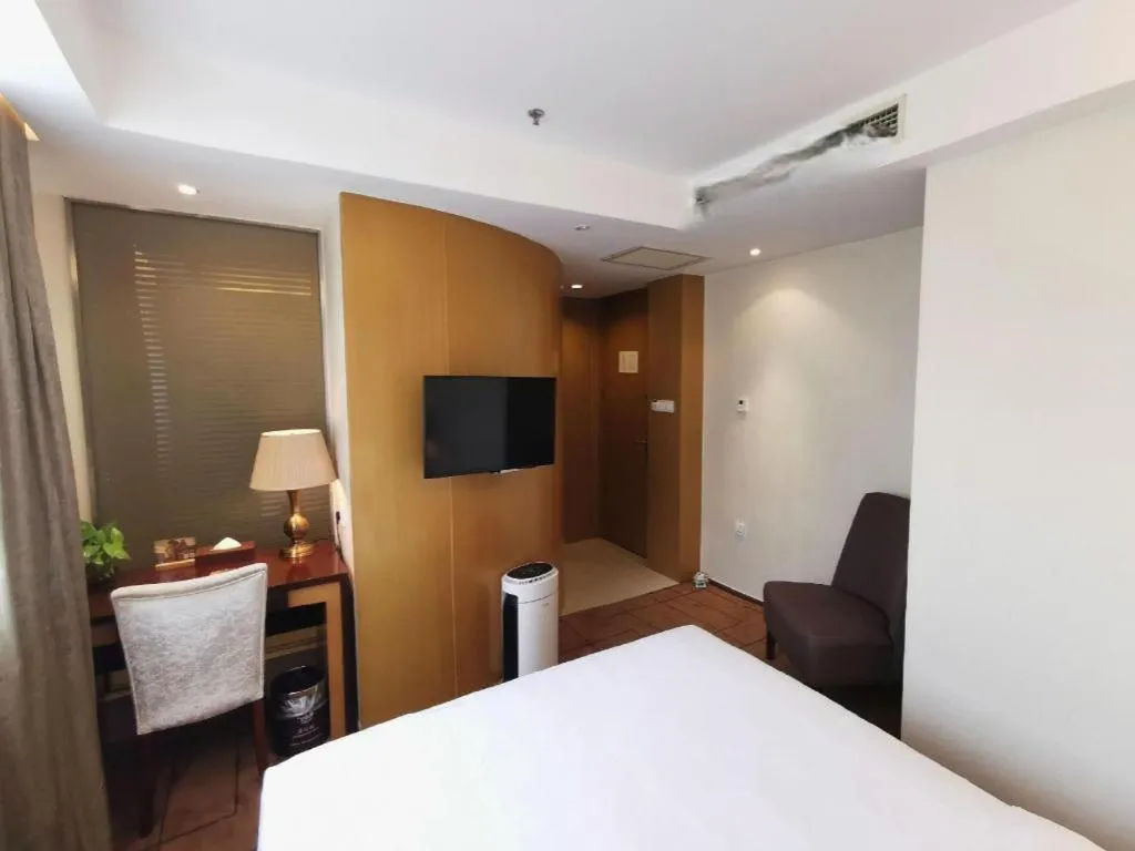 Bed in Jinjiang Metropolo Shanghai Minhang