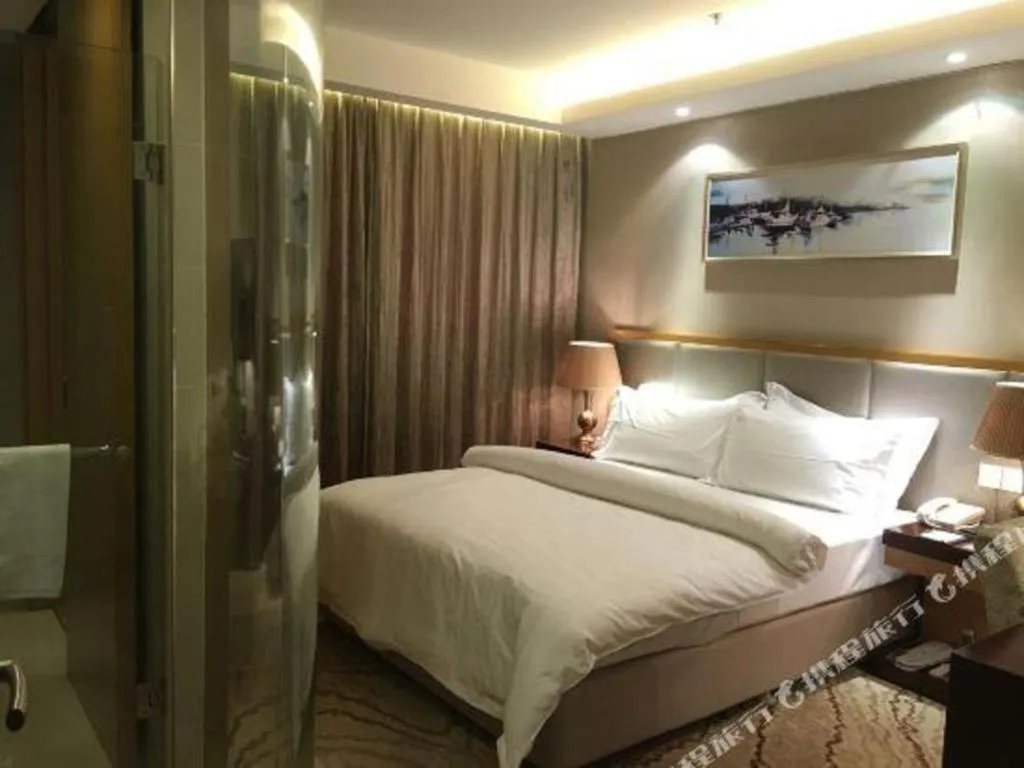 Bed in Jinjiang Metropolo Shanghai Minhang