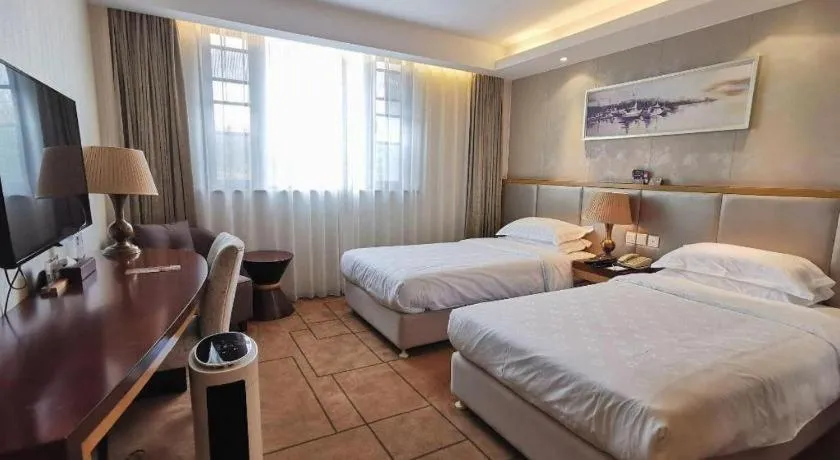 Bed in Jinjiang Metropolo Shanghai Minhang