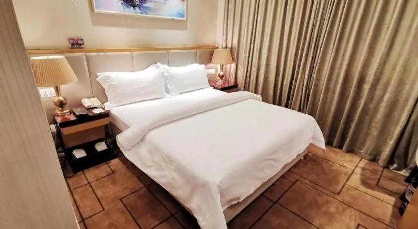 Bed in Jinjiang Metropolo Shanghai Minhang