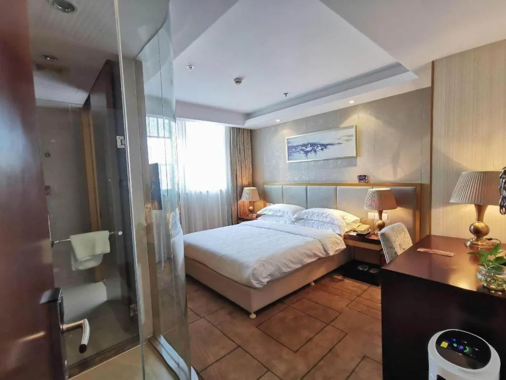 Bed in Jinjiang Metropolo Shanghai Minhang