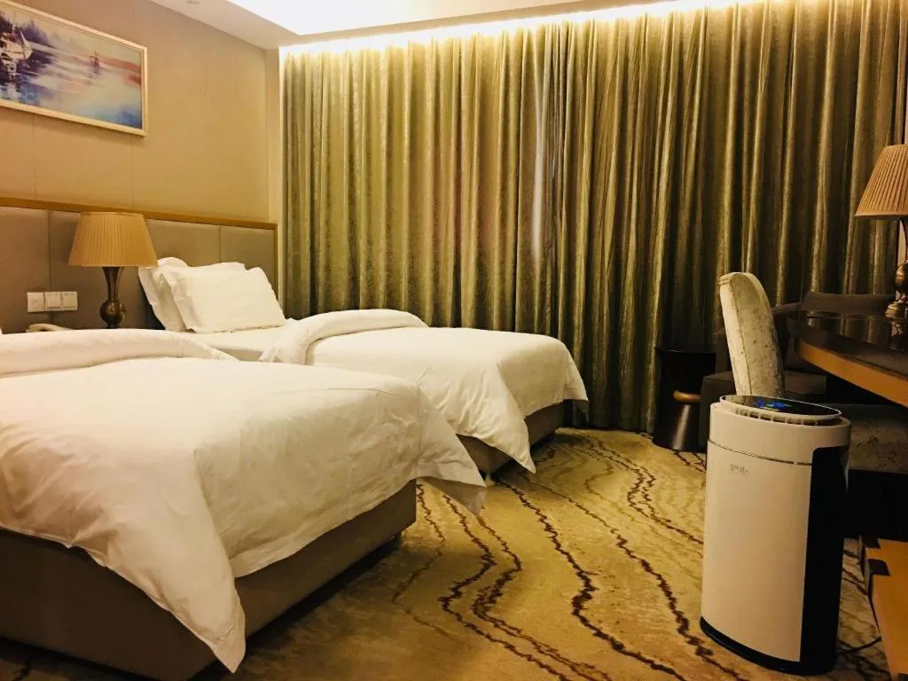 Bed in Jinjiang Metropolo Shanghai Minhang