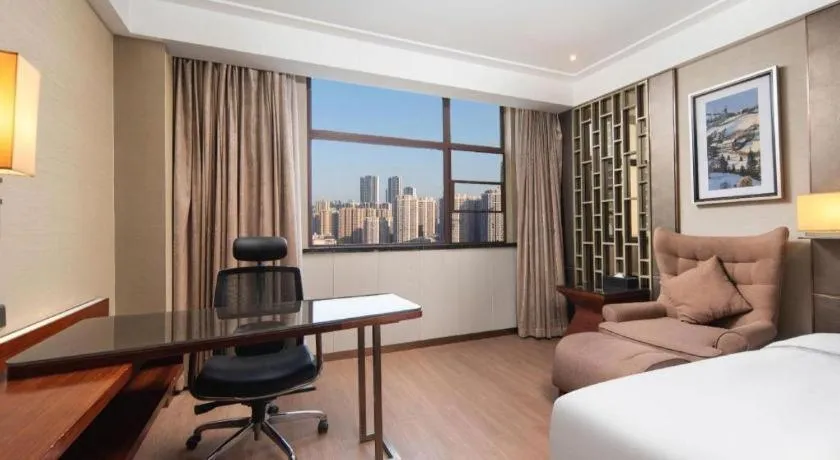 Bed in Echeng Hotel Wuhan Optics Valley Square Yangjiawan Metro Station