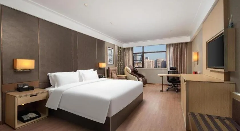 Bed in Echeng Hotel Wuhan Optics Valley Square Yangjiawan Metro Station