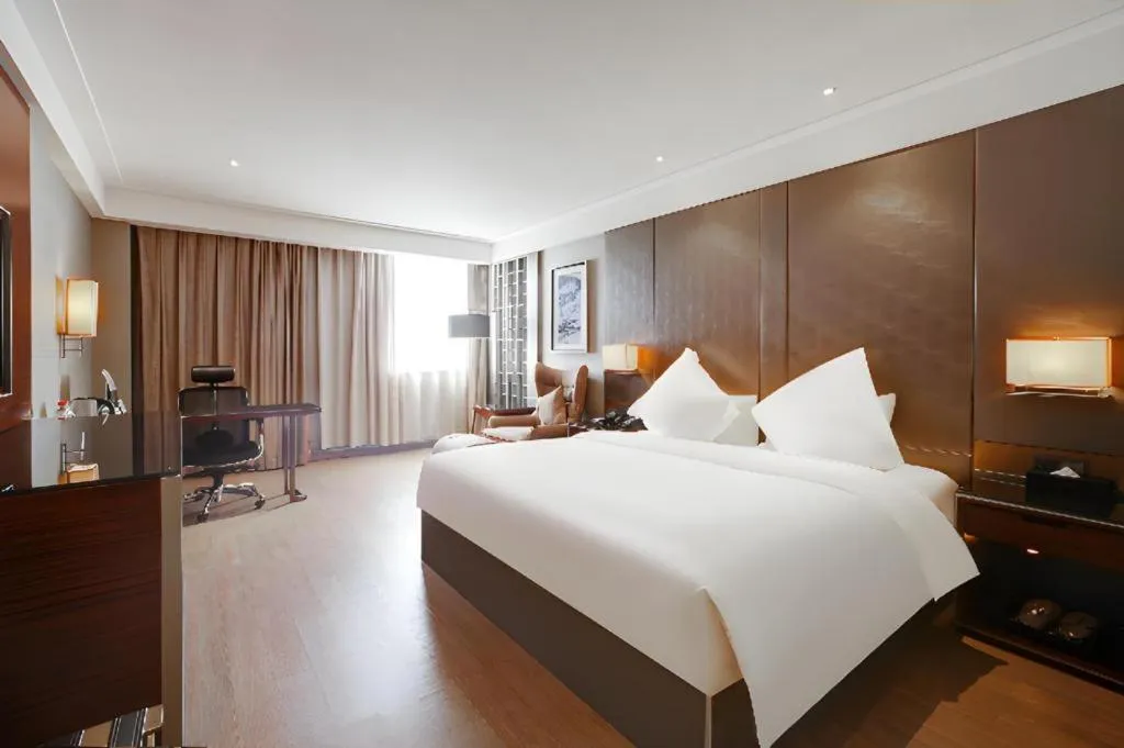 Bed in Echeng Hotel Wuhan Optics Valley Square Yangjiawan Metro Station