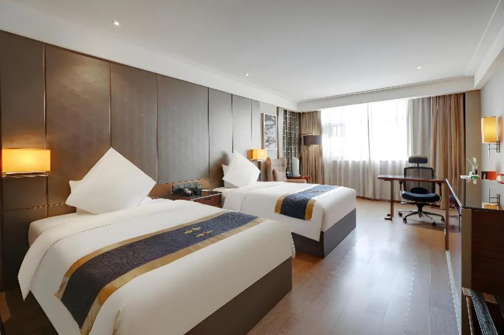 Bed in Echeng Hotel Wuhan Optics Valley Square Yangjiawan Metro Station