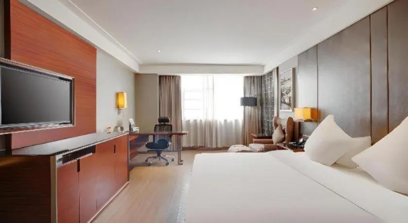 Bed in Echeng Hotel Wuhan Optics Valley Square Yangjiawan Metro Station