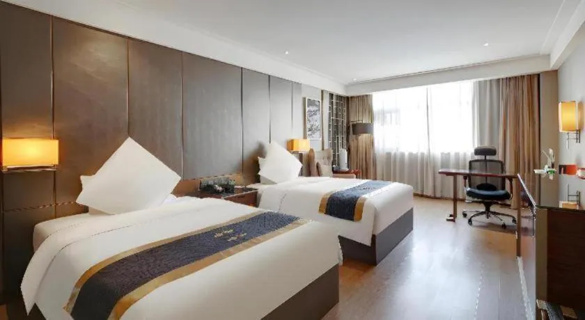 Bed in Echeng Hotel Wuhan Optics Valley Square Yangjiawan Metro Station