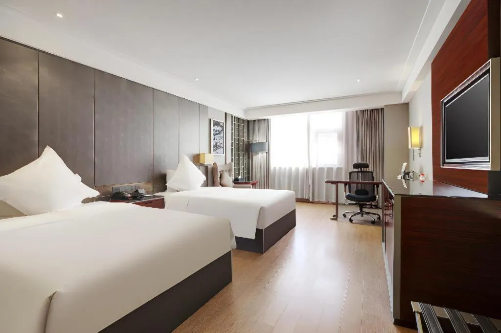 Bed in Echeng Hotel Wuhan Optics Valley Square Yangjiawan Metro Station