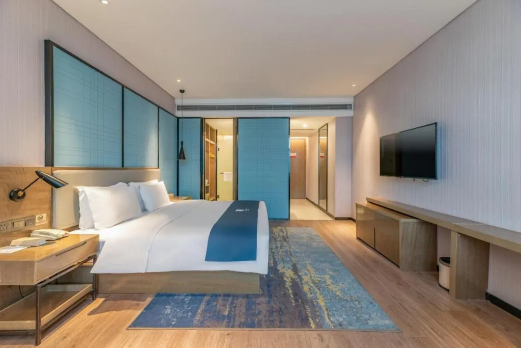 Bed in Echarm Hotel Jinan Railway Station Daming Lake