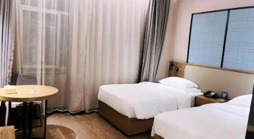 Bed in Echarm Hotel Jinan Railway Station Daming Lake