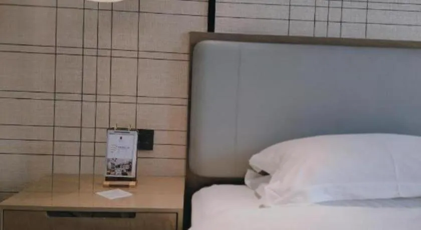 Bed in Echarm Hotel Jinan Railway Station Daming Lake