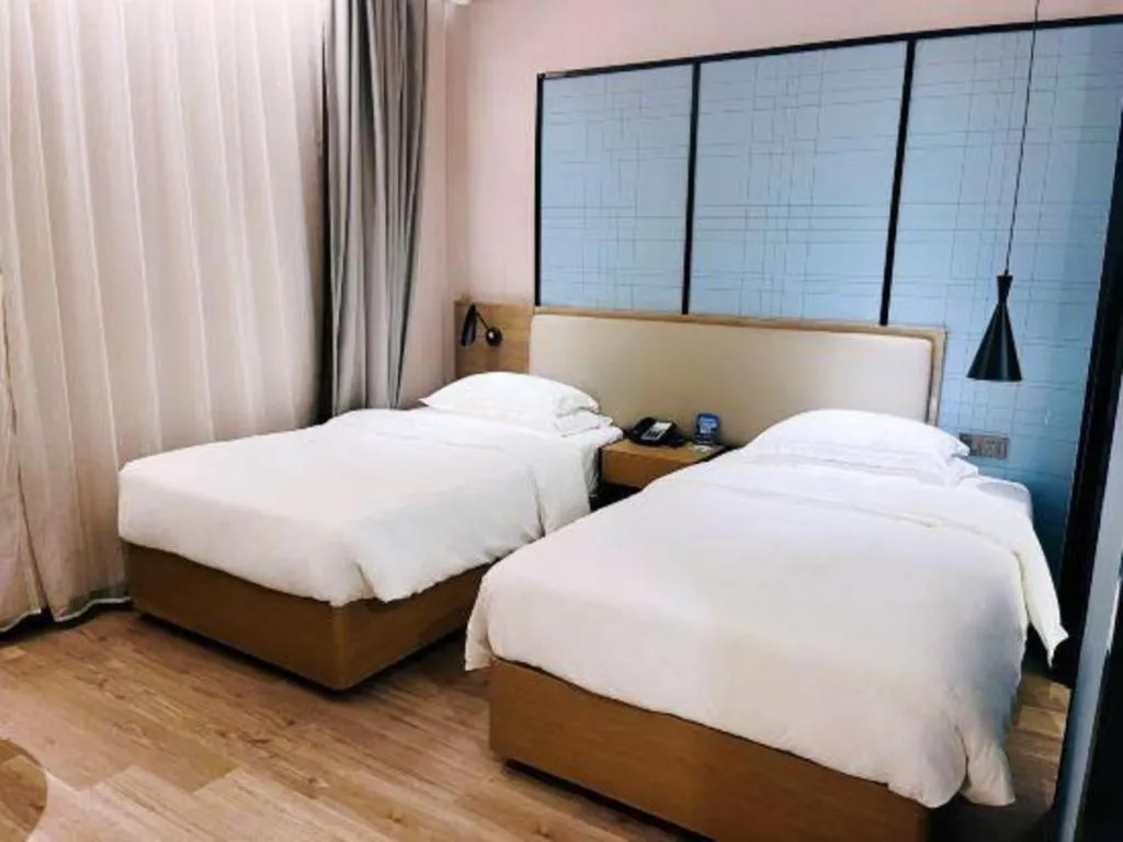Bed in Echarm Hotel Jinan Railway Station Daming Lake