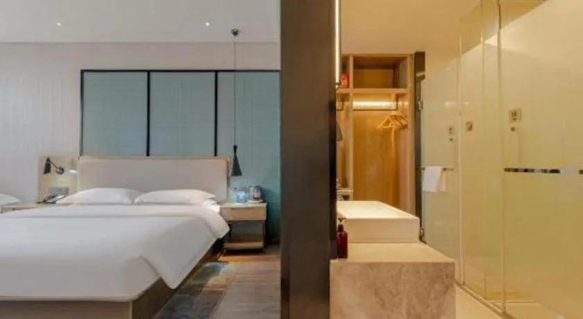 Bed in Echarm Hotel Jinan Railway Station Daming Lake