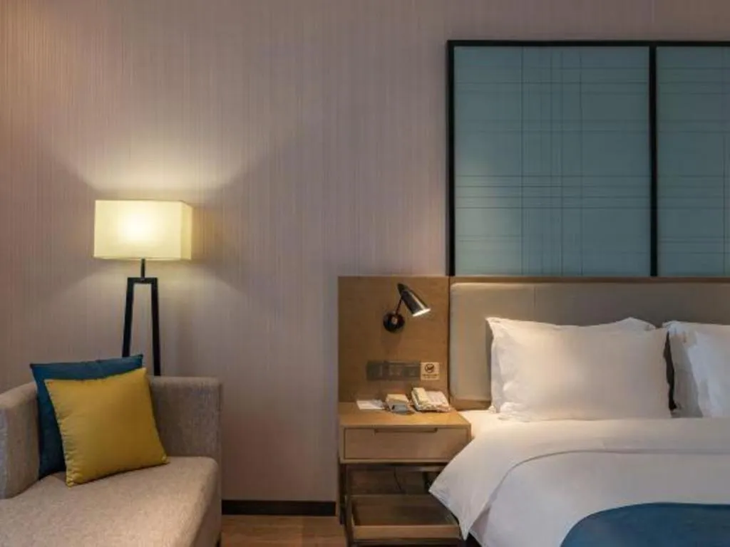 Bed in Echarm Hotel Jinan Railway Station Daming Lake