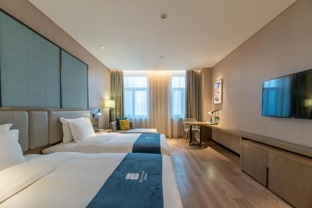 Bed in Echarm Hotel Jinan Railway Station Daming Lake