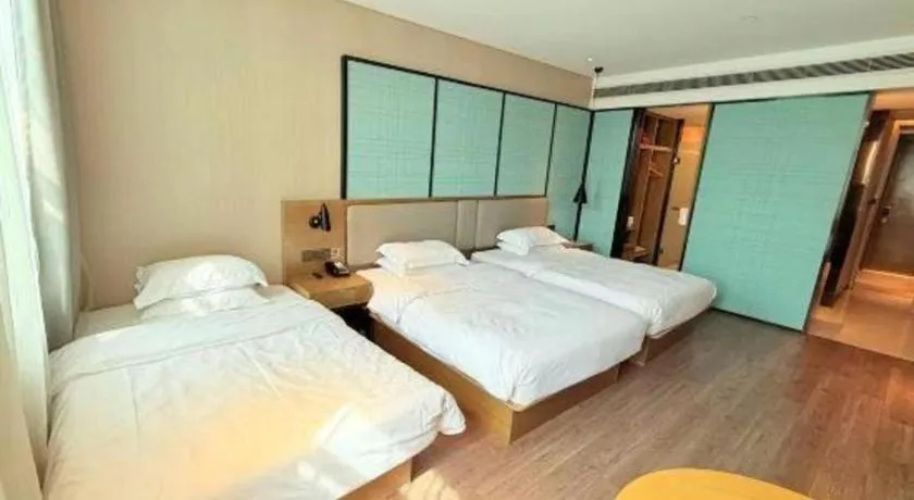 Bed in Echarm Hotel Jinan Railway Station Daming Lake