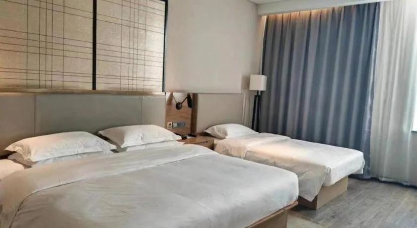 Bed in Echarm Hotel Jinan Railway Station Daming Lake
