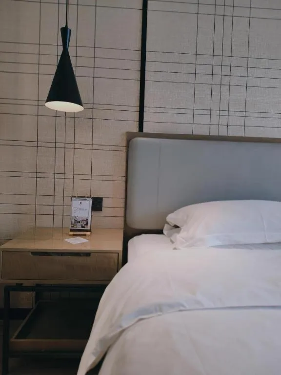 Bed in Echarm Hotel Jinan Railway Station Daming Lake