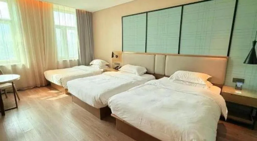 Bed in Echarm Hotel Jinan Railway Station Daming Lake
