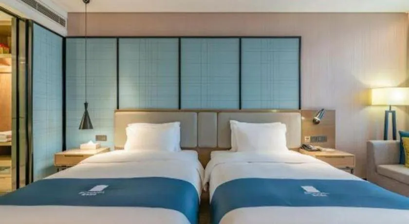 Bed in Echarm Hotel Jinan Railway Station Daming Lake