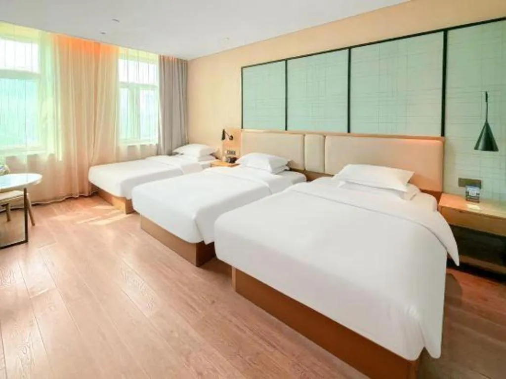 Bed in Echarm Hotel Jinan Railway Station Daming Lake