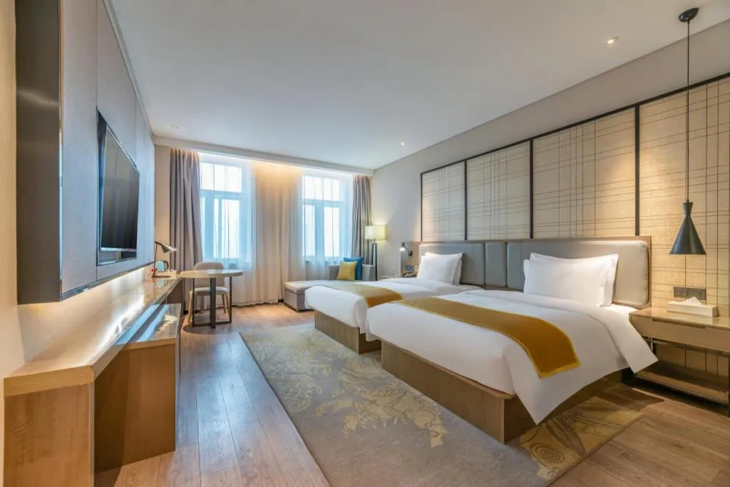 Bed in Echarm Hotel Jinan Railway Station Daming Lake