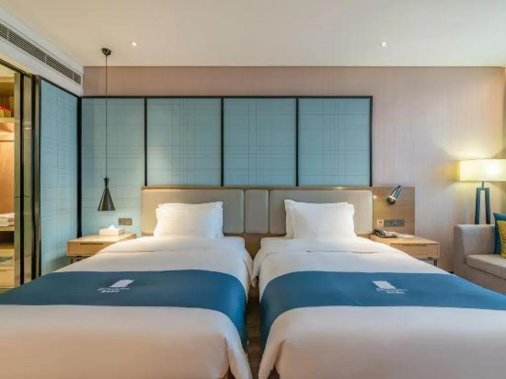 Bed in Echarm Hotel Jinan Railway Station Daming Lake