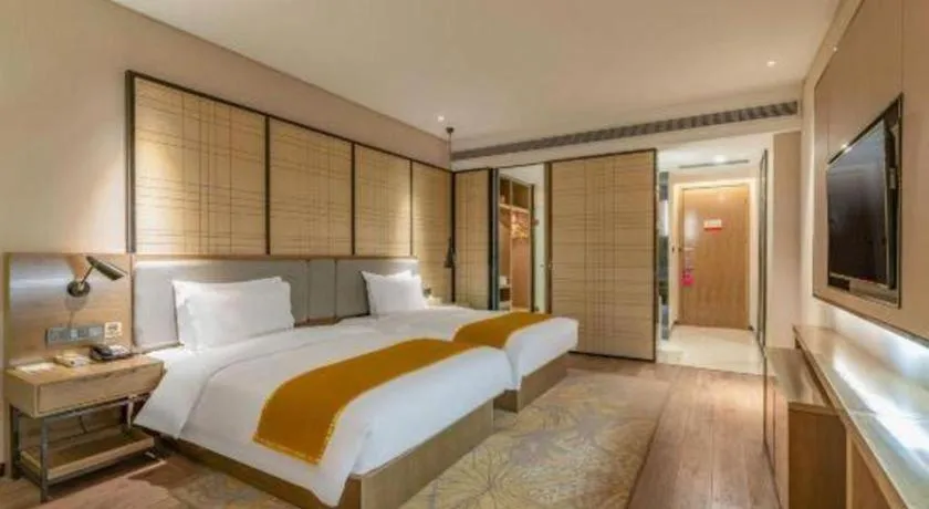 Bed in Echarm Hotel Jinan Railway Station Daming Lake