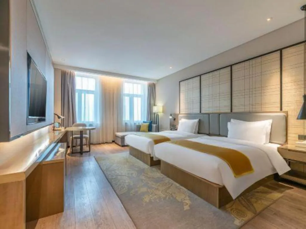 Bed in Echarm Hotel Jinan Railway Station Daming Lake