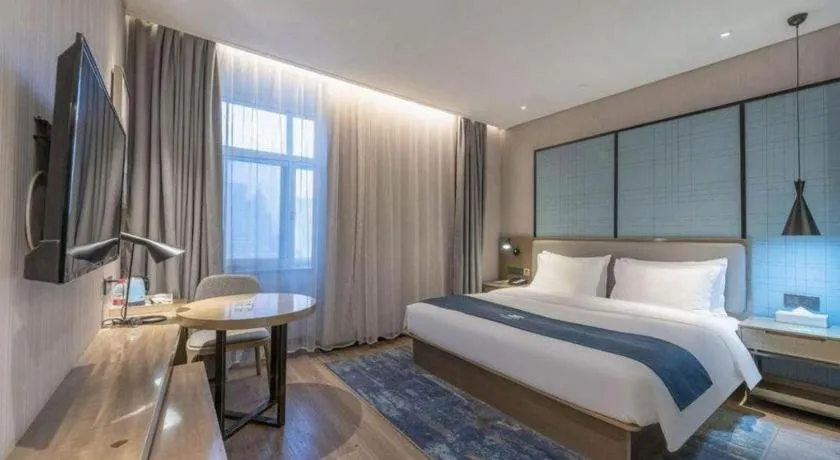 Bed in Echarm Hotel Jinan Railway Station Daming Lake