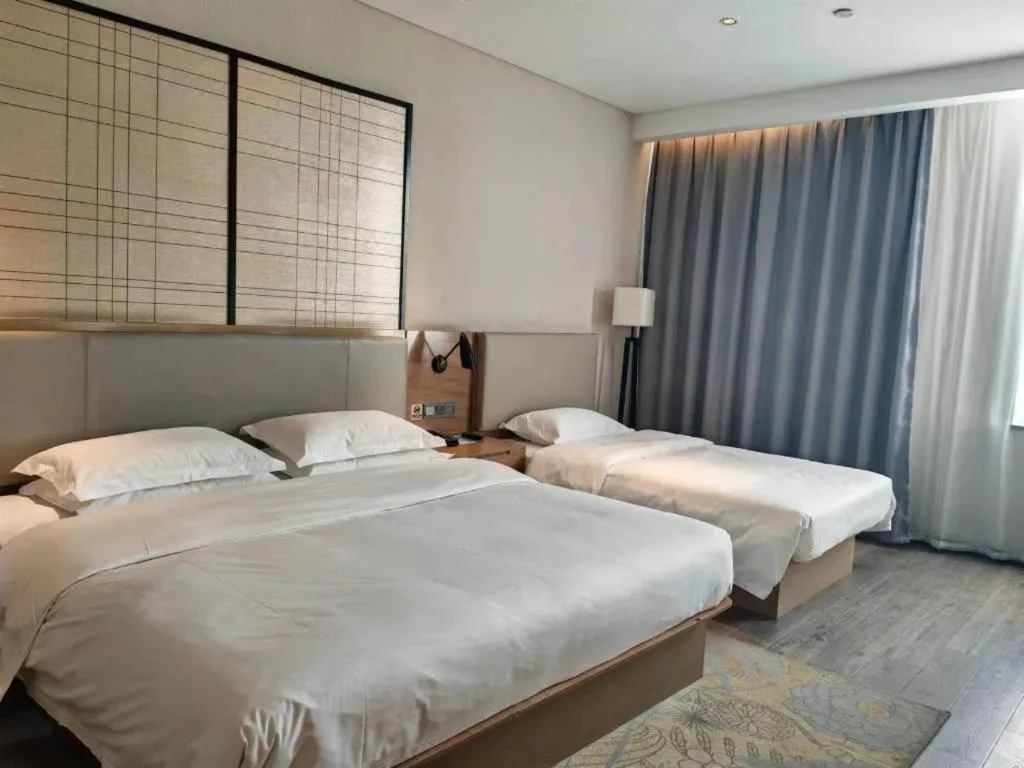Bed in Echarm Hotel Jinan Railway Station Daming Lake