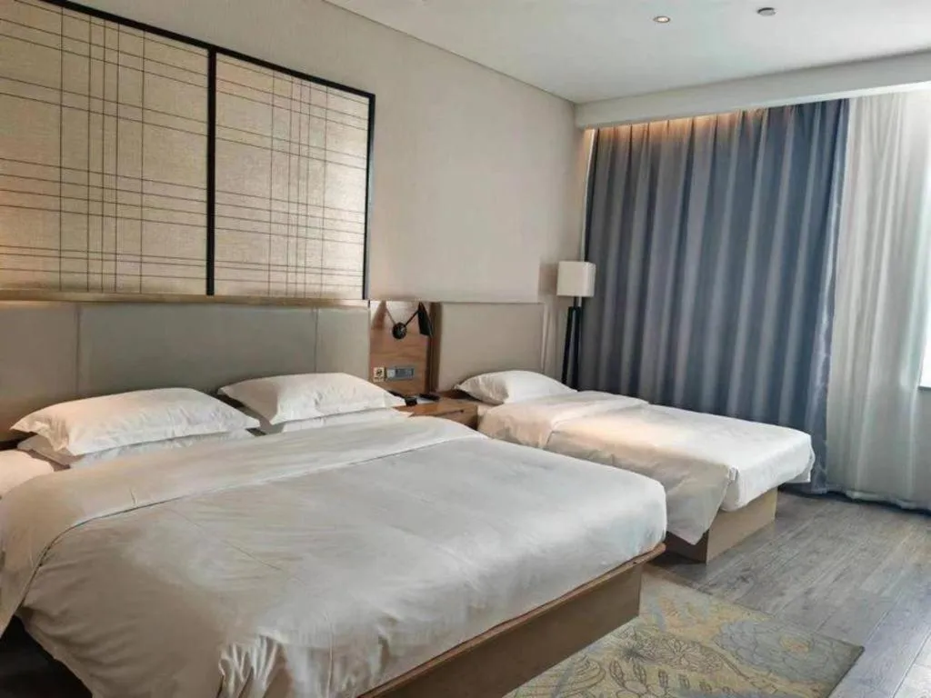 Bed in Echarm Hotel Jinan Railway Station Daming Lake