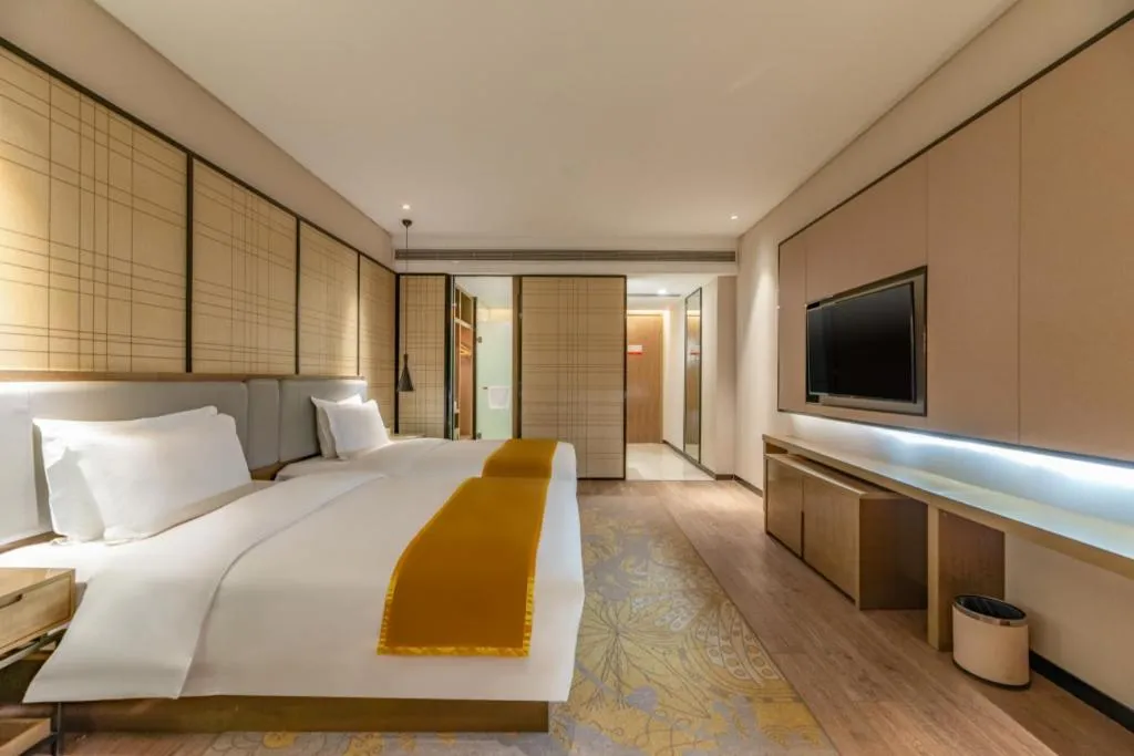 Bed in Echarm Hotel Jinan Railway Station Daming Lake