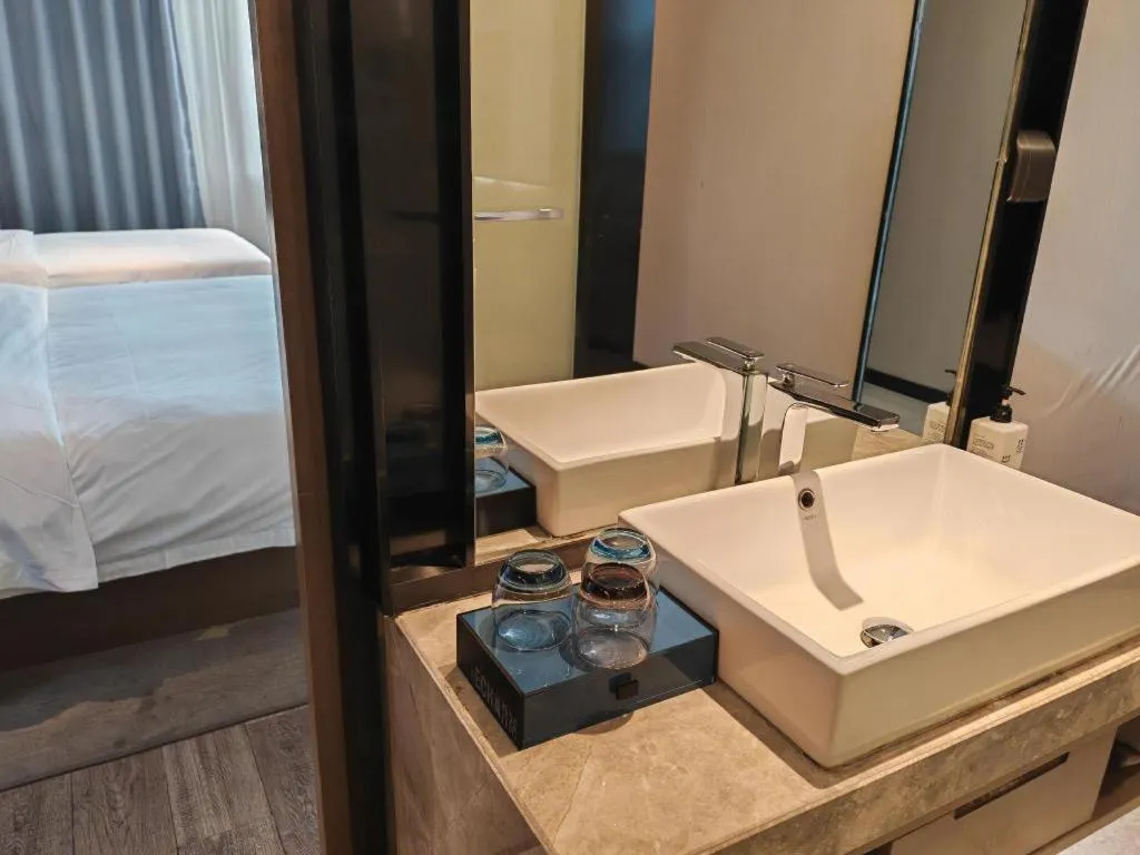 Bed in Echarm Hotel Jinan Railway Station Daming Lake