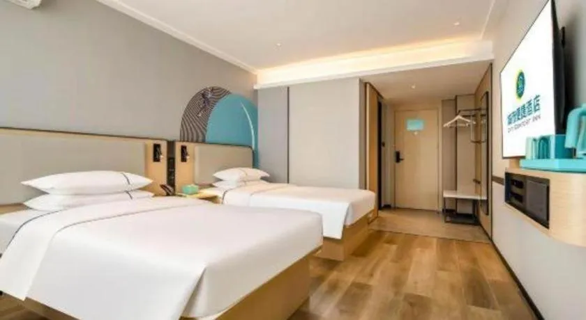 Bed in City Comfort Inn Wuzhou Municipal Square