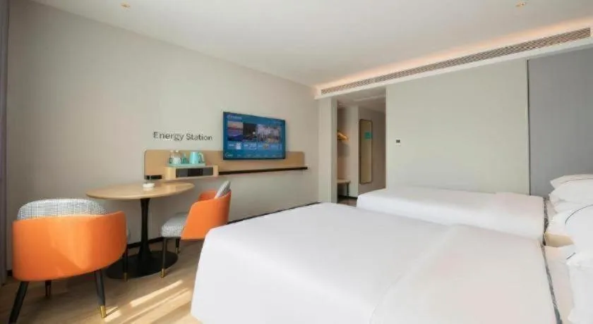 Bed in City Comfort Inn Wuzhou Municipal Square