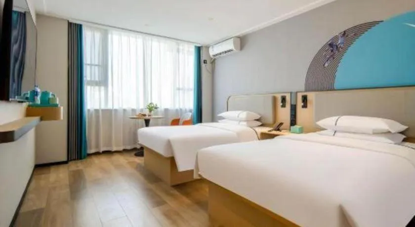 Bed in City Comfort Inn Wuzhou Municipal Square