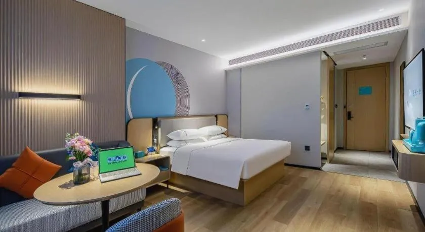 Bed in City Comfort Inn Wuzhou Municipal Square