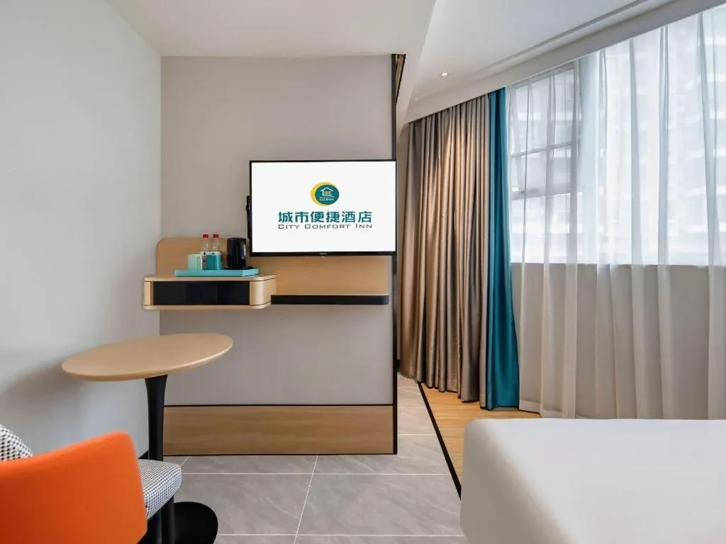 Bed in City Comfort Inn Wuzhou Municipal Square