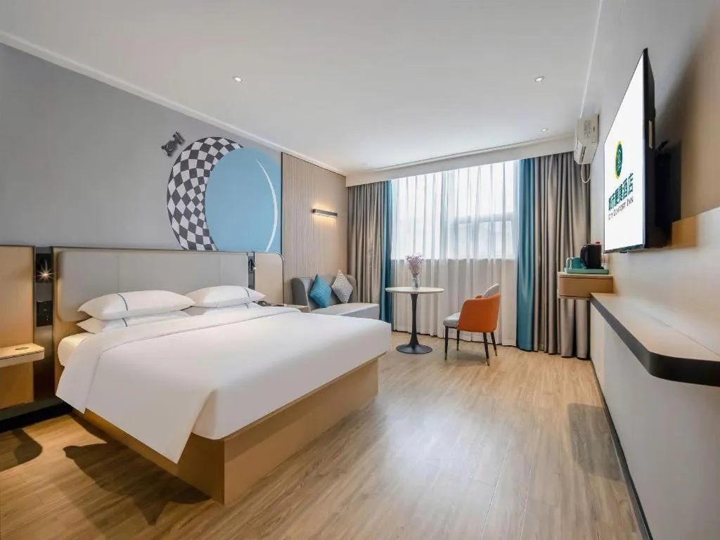 Bed in City Comfort Inn Wuzhou Municipal Square