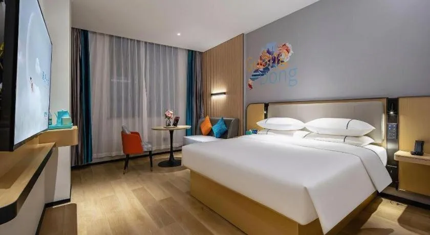 Bed in City Comfort Inn Wuzhou Municipal Square