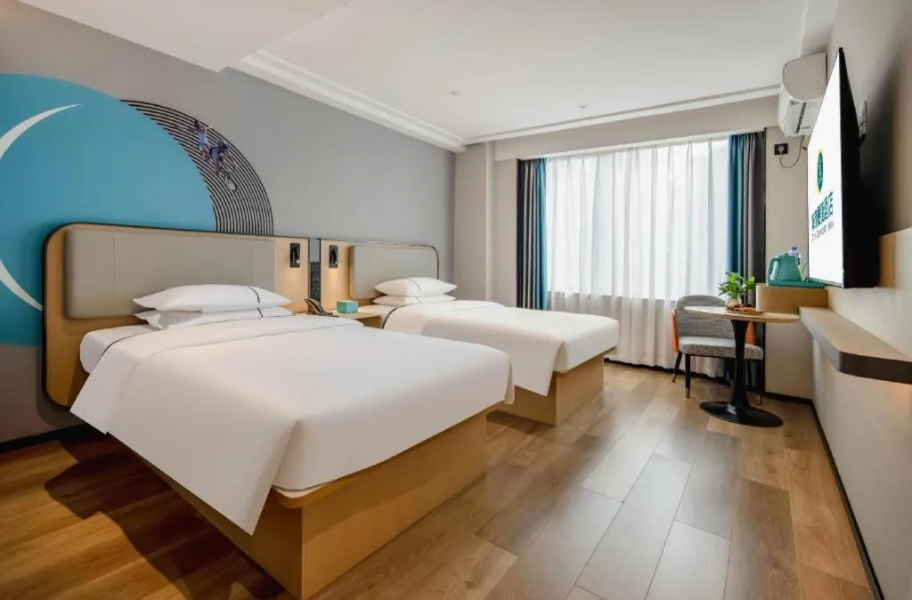 Bed in City Comfort Inn Wuzhou Municipal Square