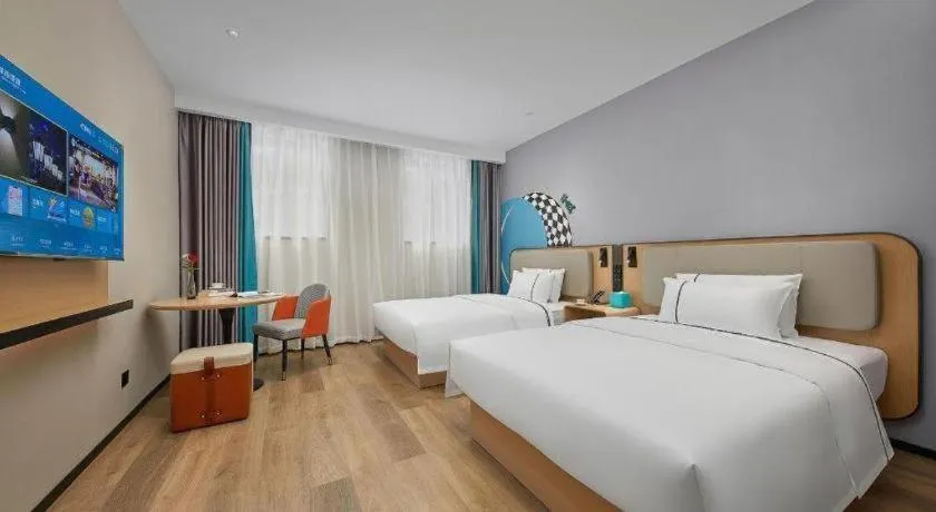 Bed in City Comfort Inn Wuzhou Municipal Square