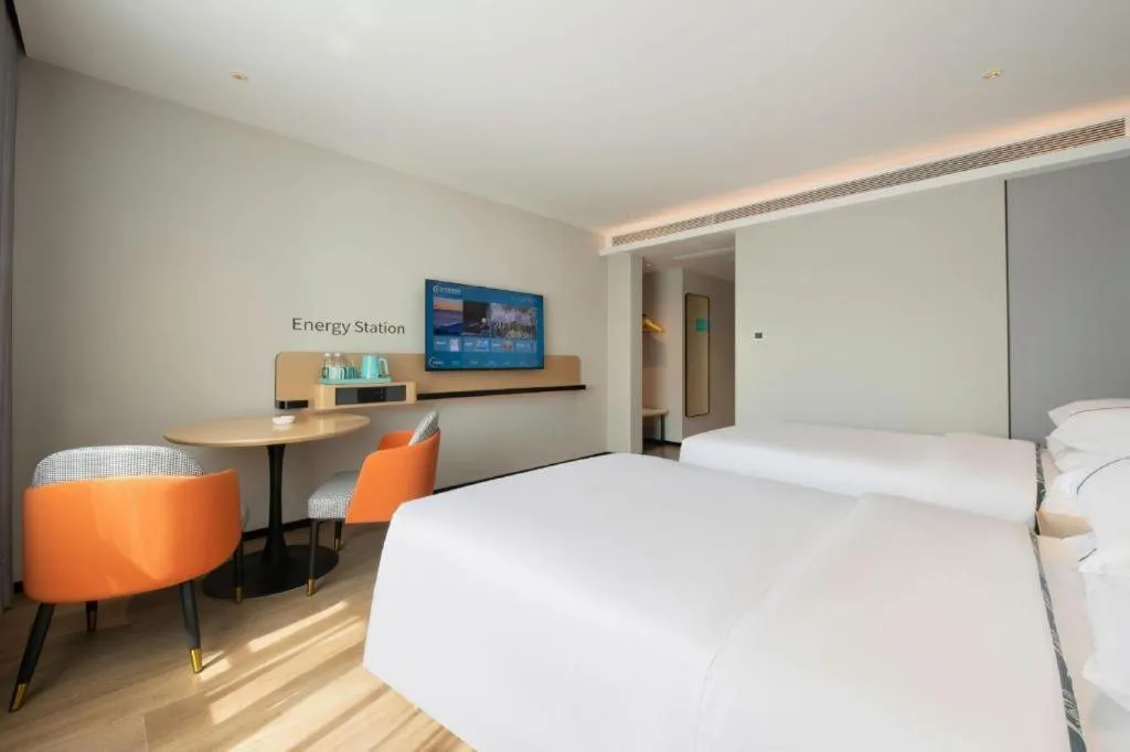 Bed in City Comfort Inn Wuzhou Municipal Square