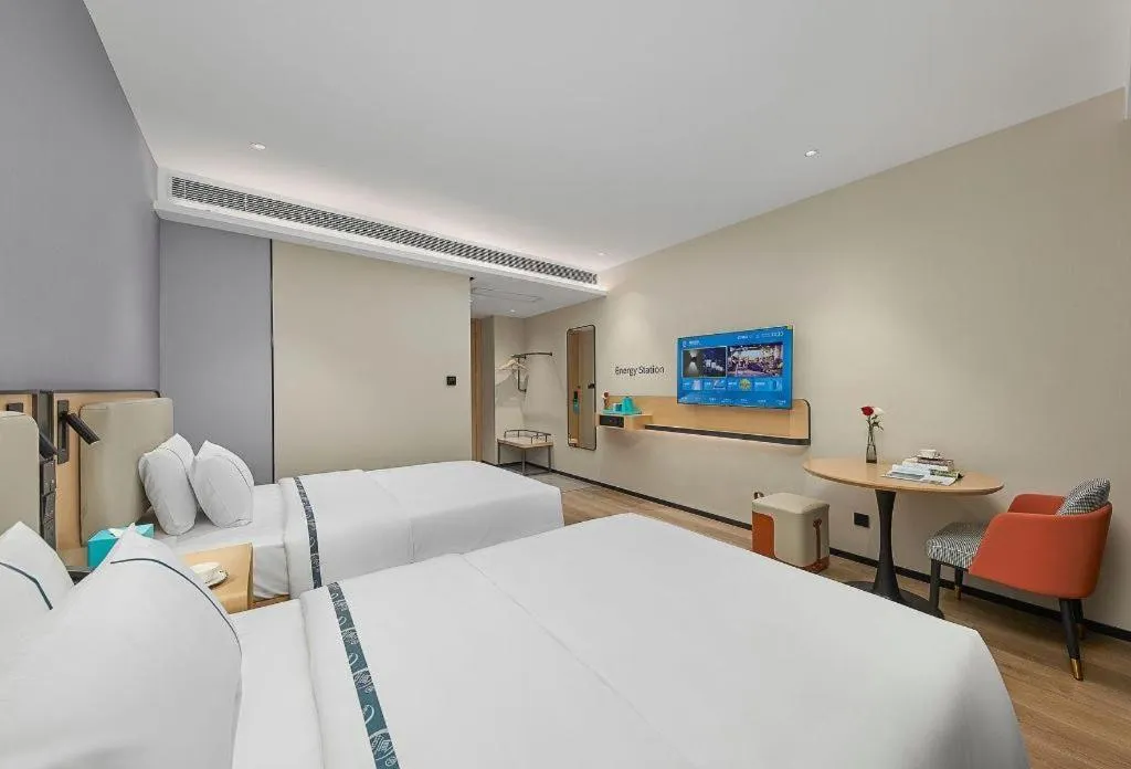 Bed in City Comfort Inn Wuzhou Municipal Square