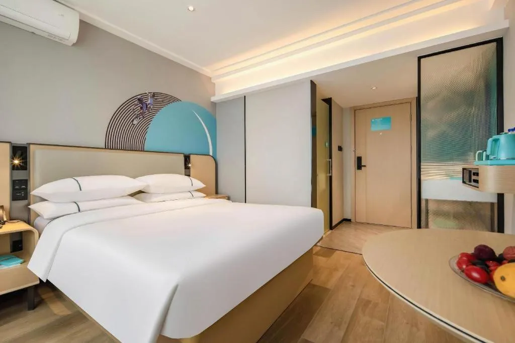 Bed in City Comfort Inn Wuzhou Municipal Square