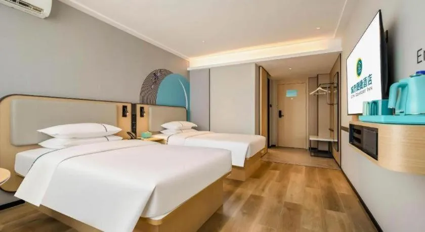 Bed in City Comfort Inn Wuzhou Municipal Square