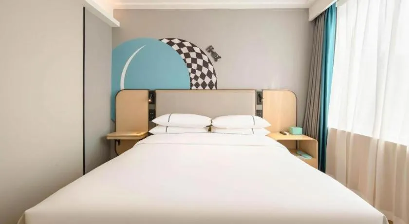 Bed in City Comfort Inn Wuzhou Municipal Square