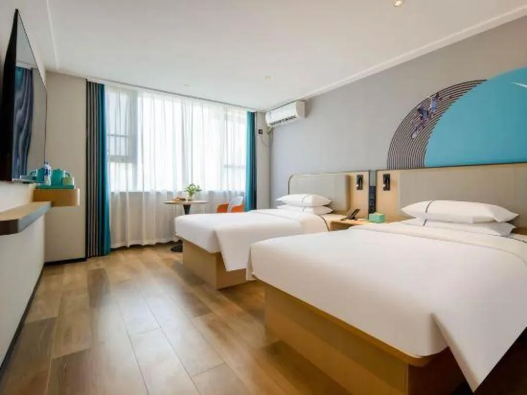 Bed in City Comfort Inn Wuzhou Municipal Square